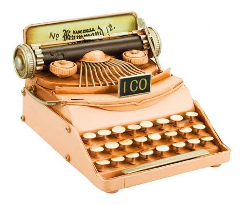 máquina de escrever antiga vs moderna para decoração